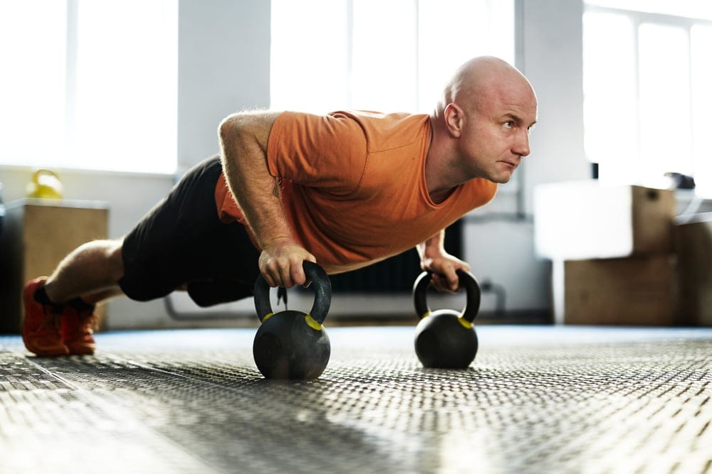 Man using gym equiptment.