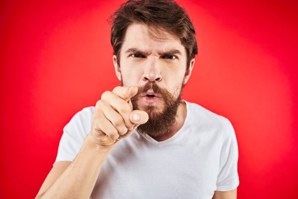 Angry man pointing his finger.