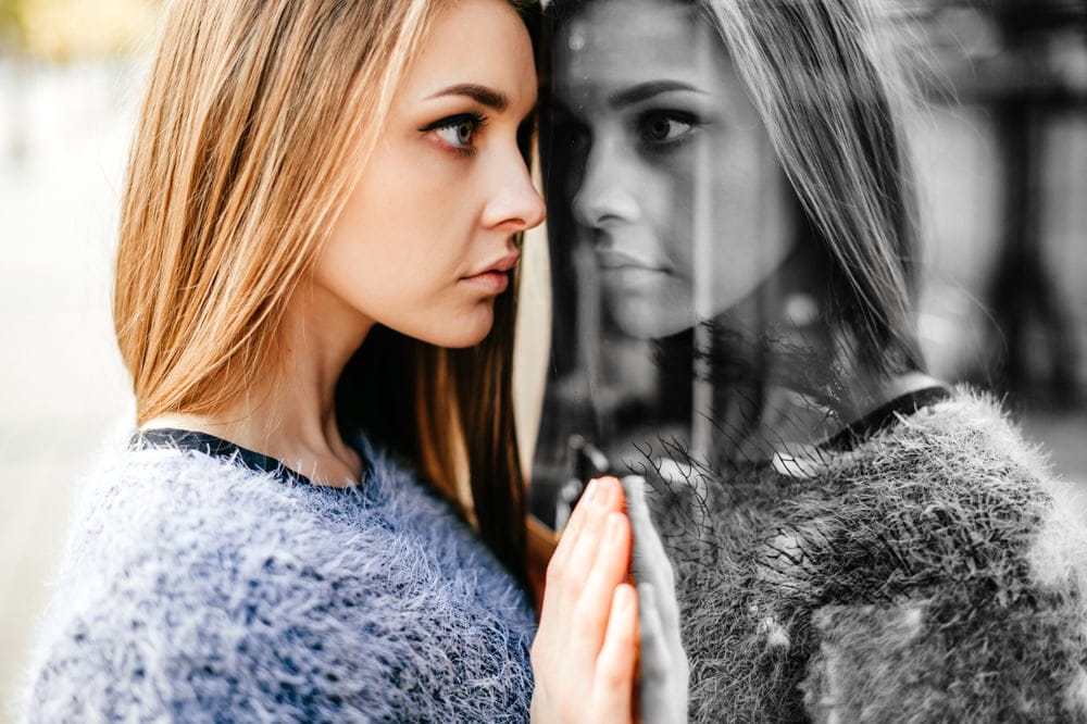 Woman looking at her reflection.