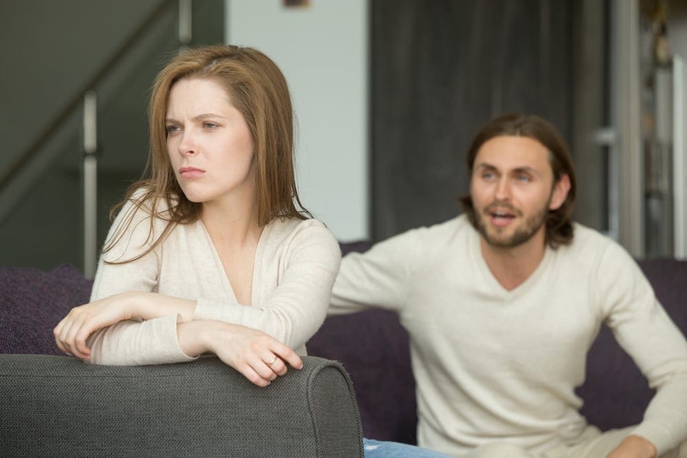 Unhappy young couple.