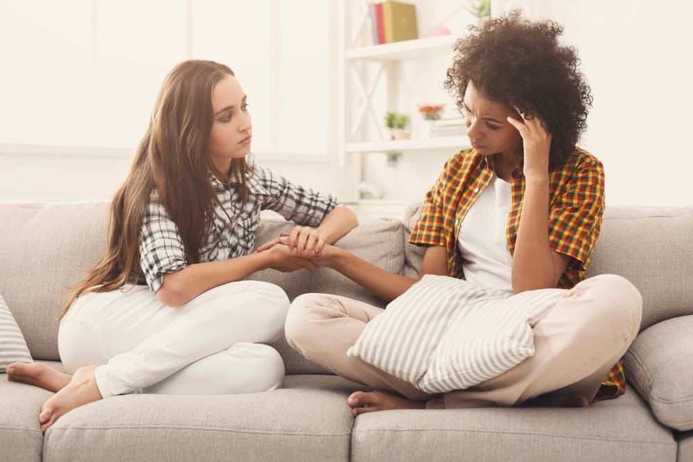 Two women in a serious talk.