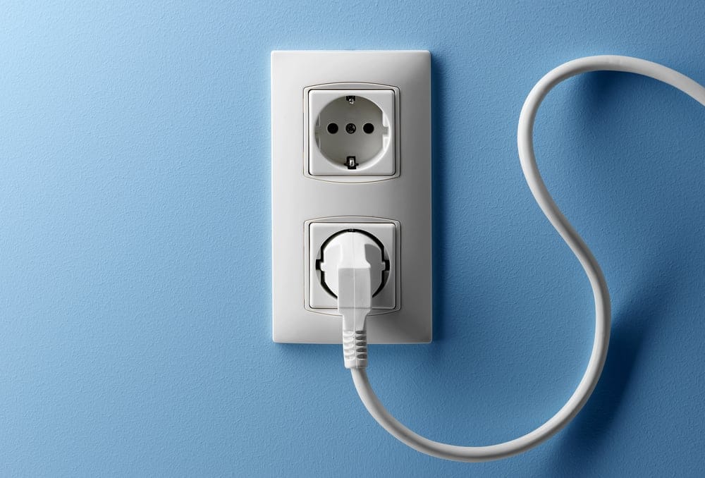 Wall socket with a cord.