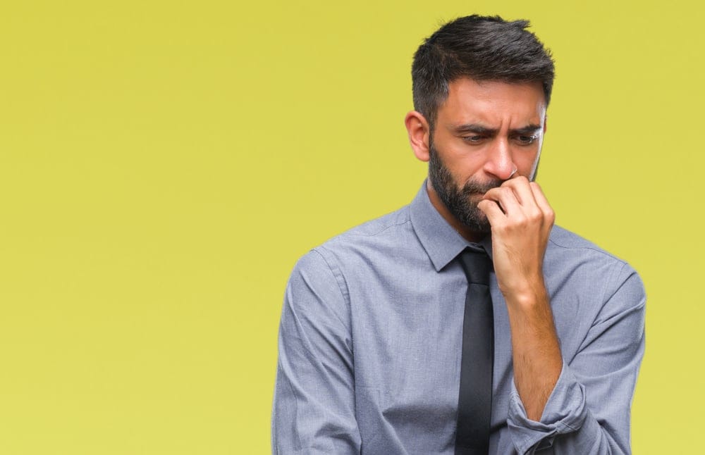Man pondering his plans.