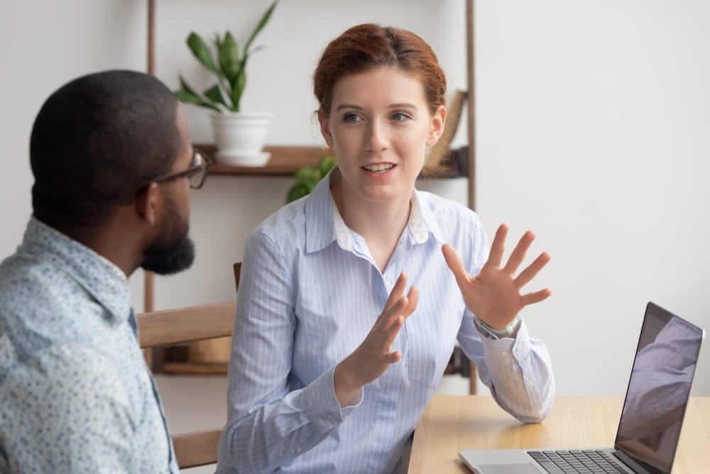 Two people in a business setting.