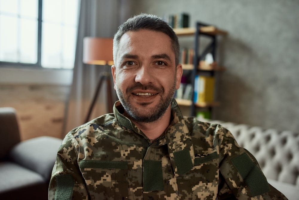Army soldier in his fatugues.