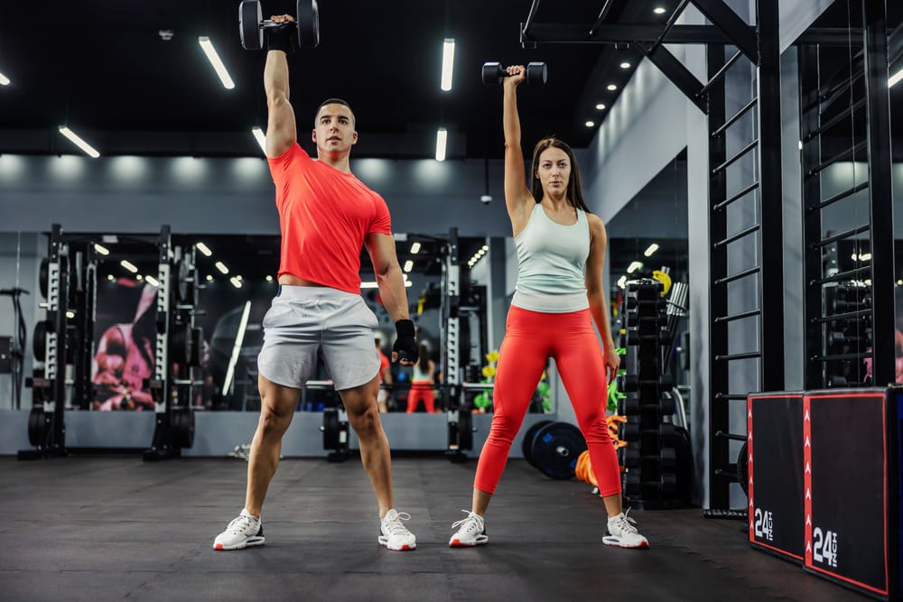 Man and woman in th gym.