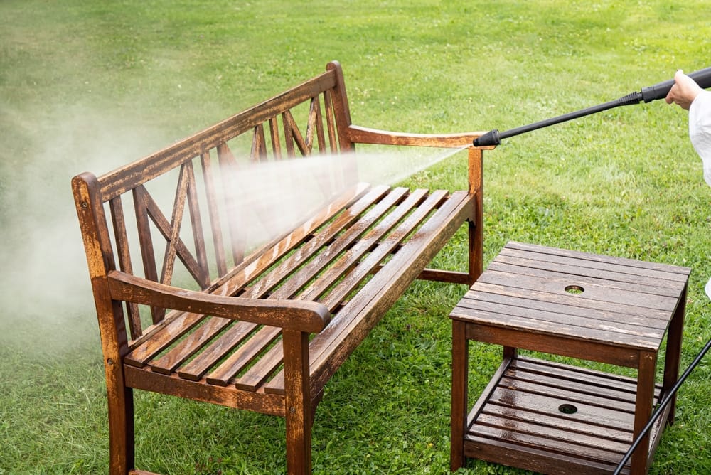 Cleaning outdoor furniture.