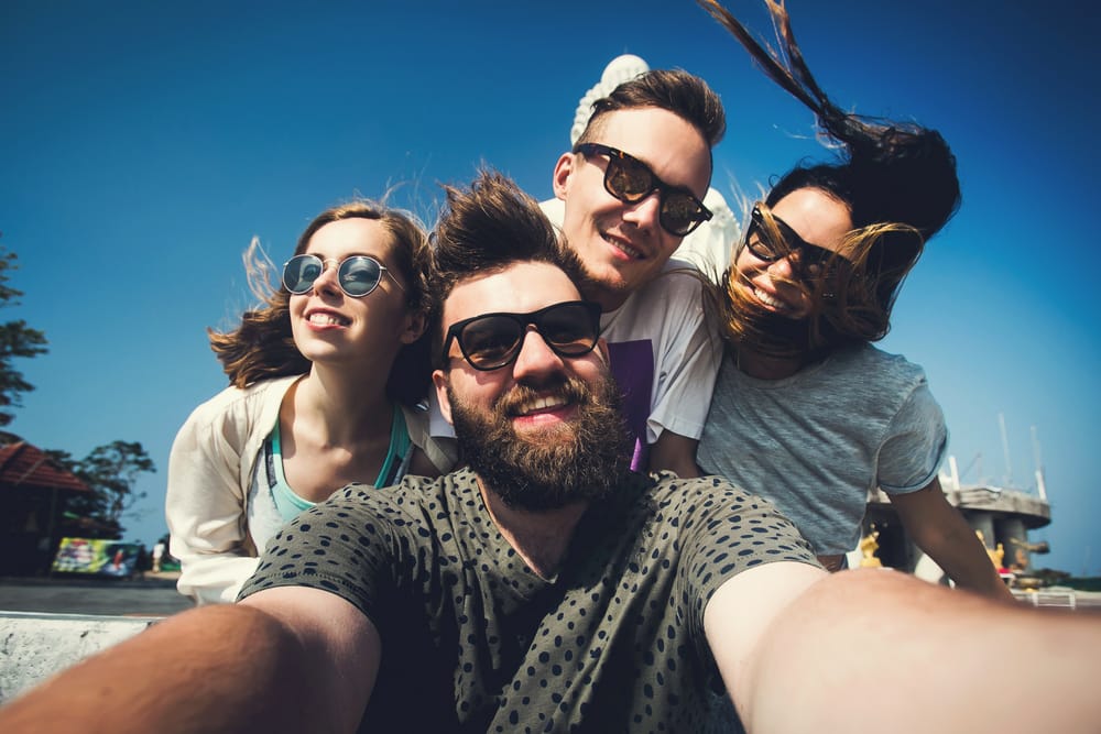Young people taking a selfie.