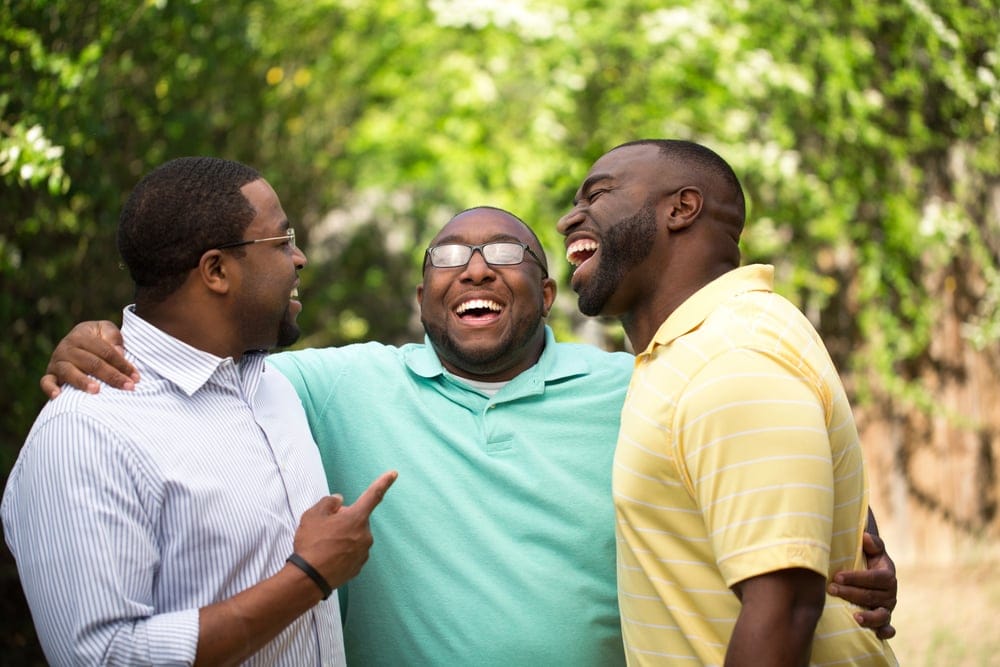 Family members laughing together.