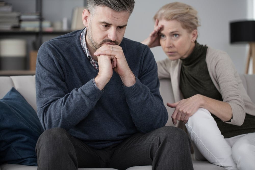 Worried husband with his wife.