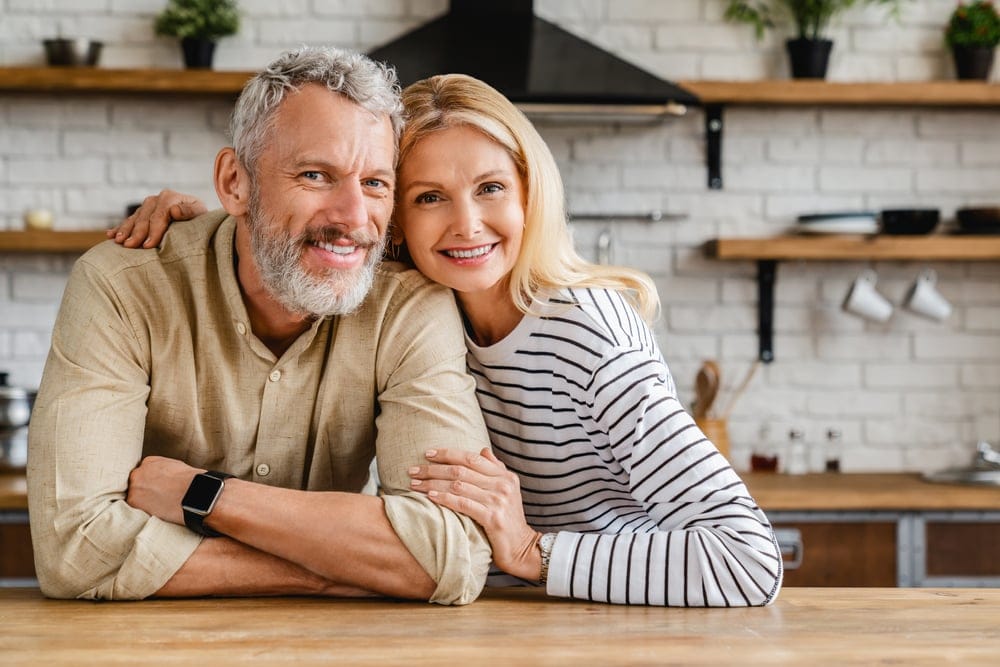 Happy couple at home.