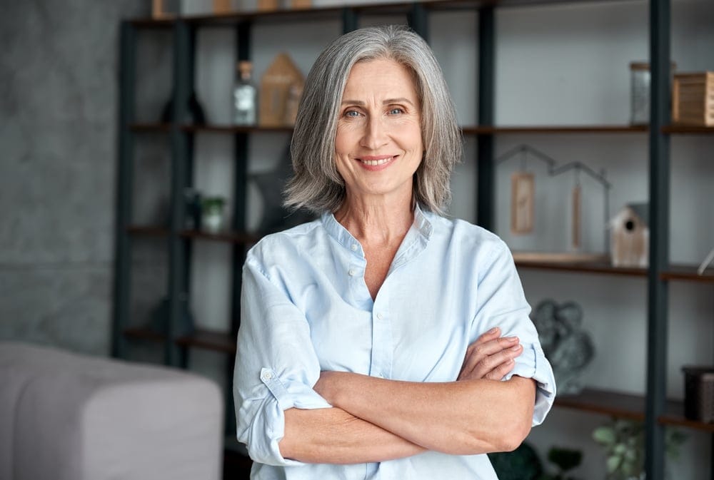 Woman with her arms crossed.