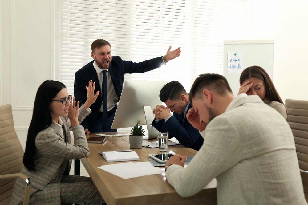 Boss angry at his employees.