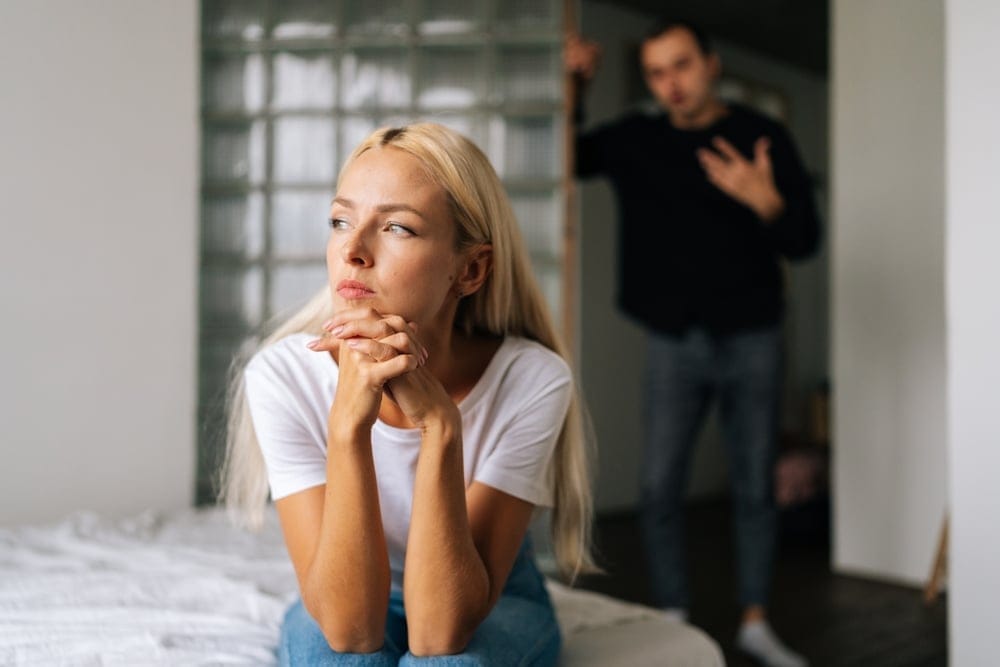 Woman sitting alone at home.