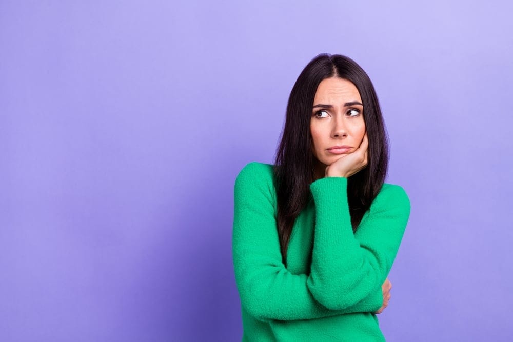 Woman feeling overwhelmed.