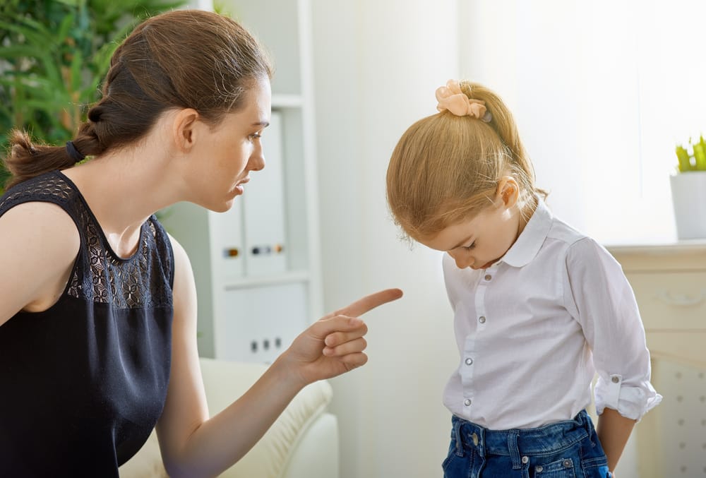 Mother scolds child.
