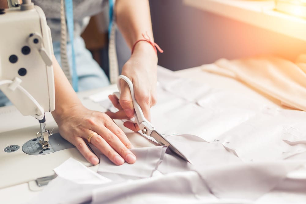 Woman sewing with a pattern.