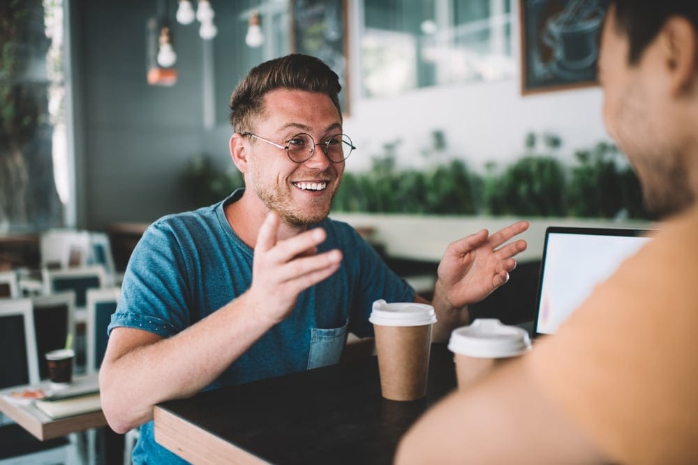 Man having coffee in a cafe.