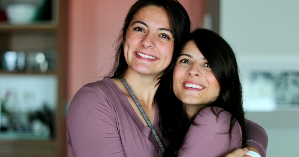 Sisters posing together for a picture