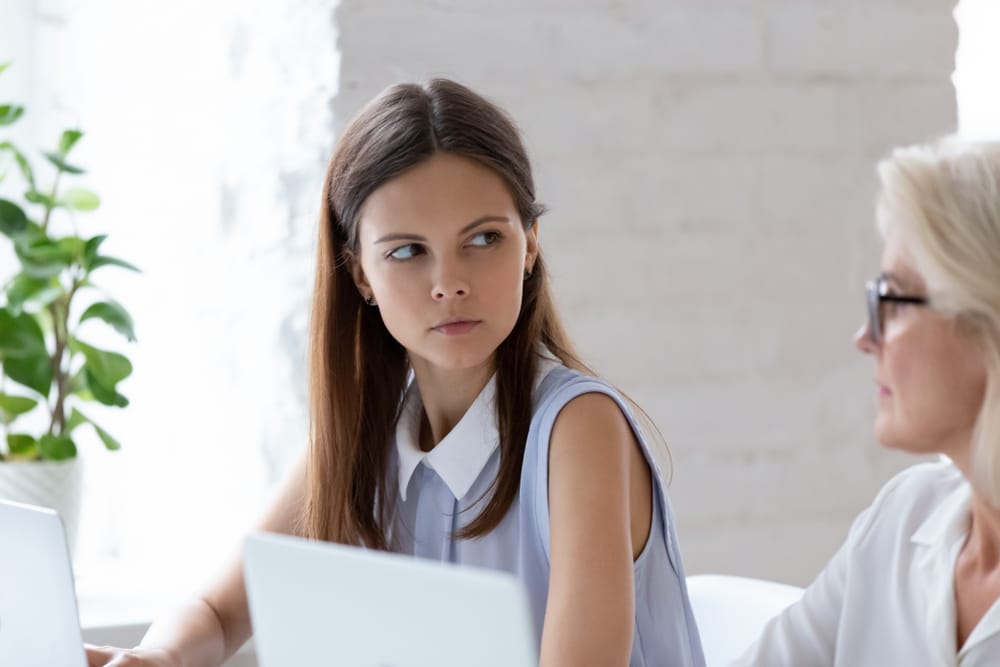Two women in deep conversation.