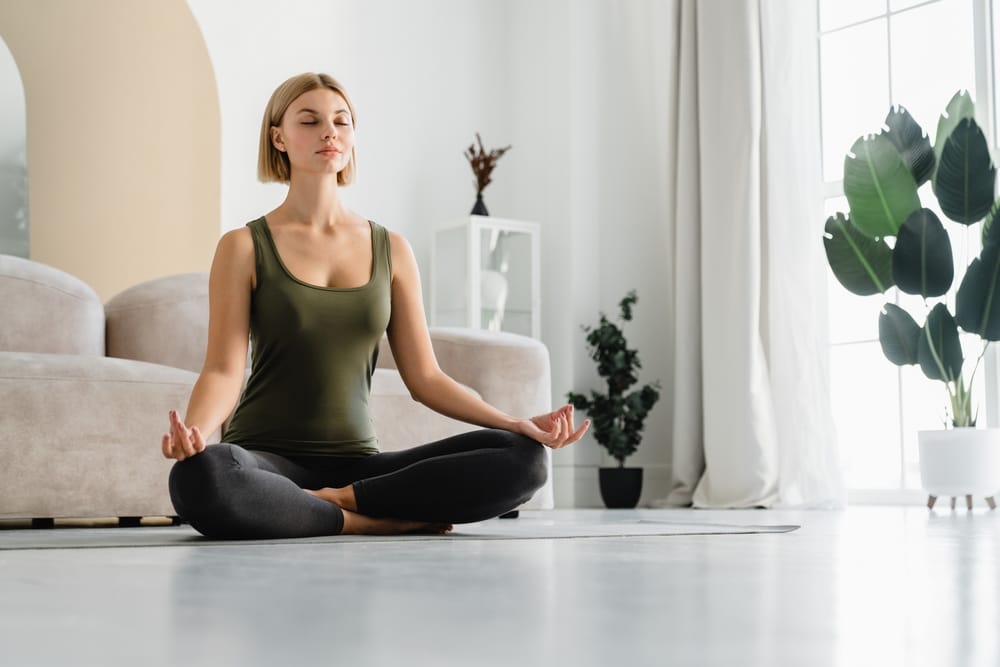 Young woman practicing yoga.