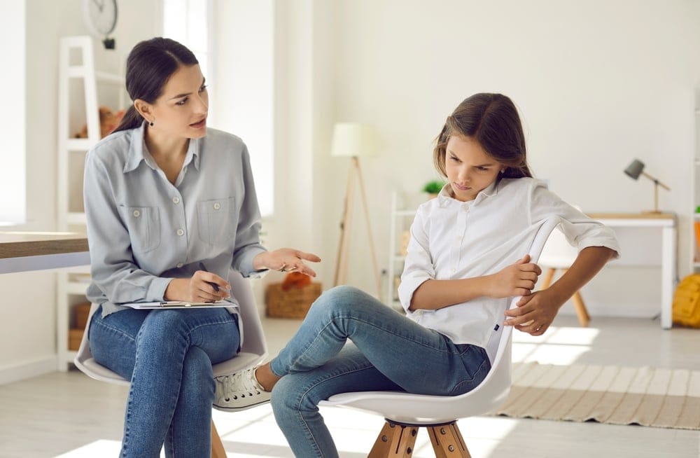 Teenager with her therapist.