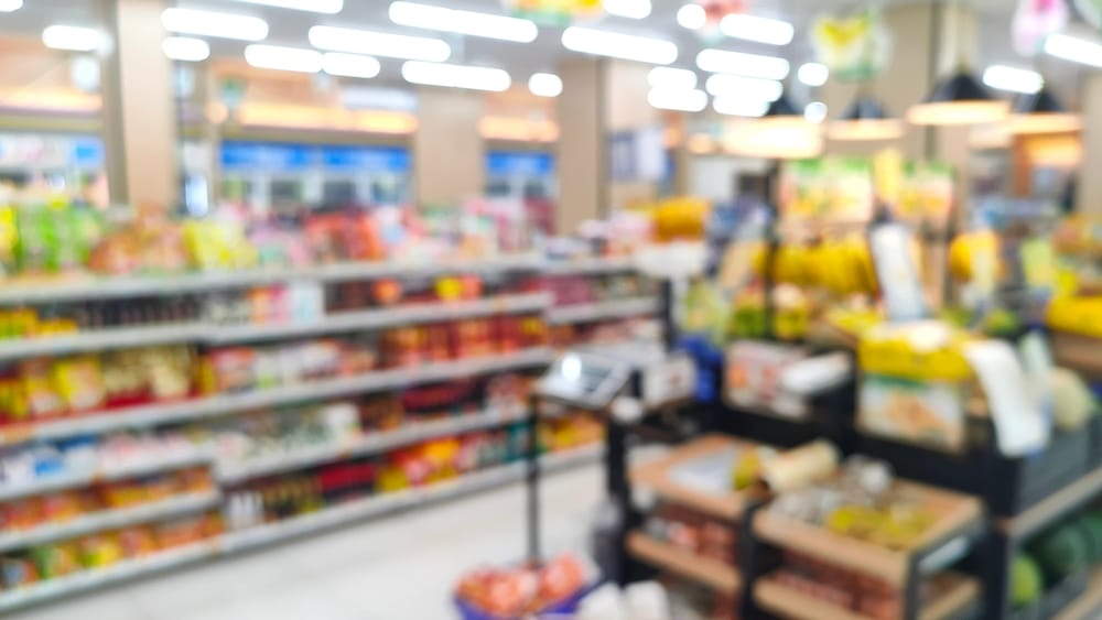 Grocery store stocked with food.
