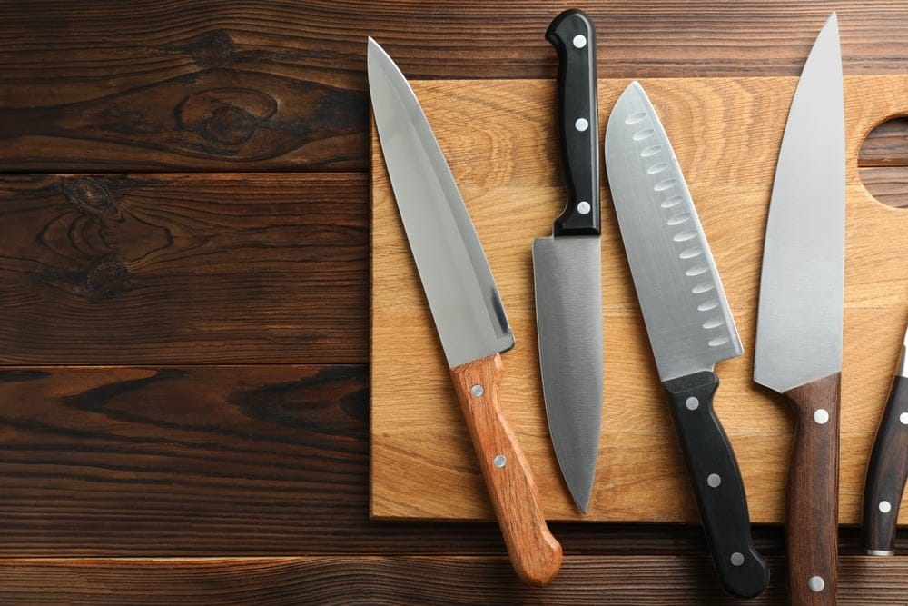 Knives on a cutting board.