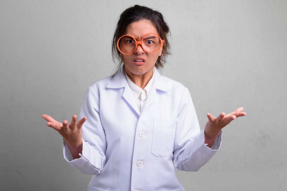 Woman wearing red eyeglasses.