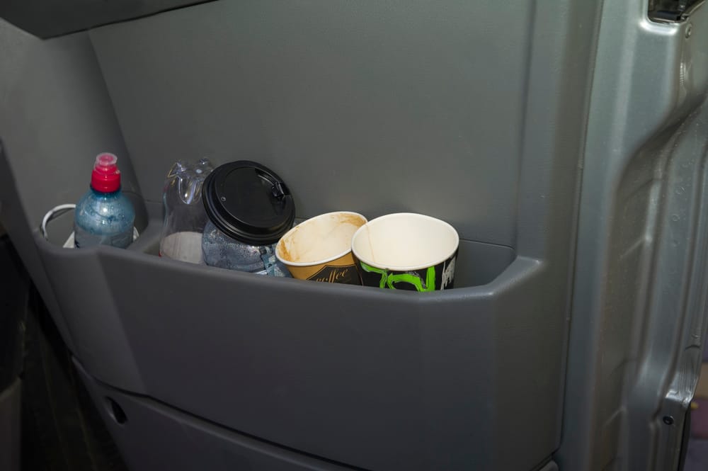 Garbage in the interior of a car.