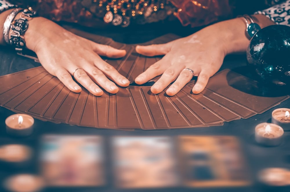 Fortune teller with tarot cards.