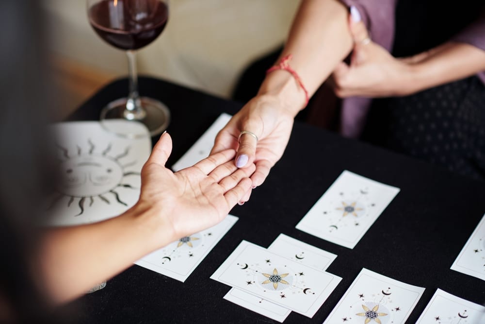Fortune teller with cards.