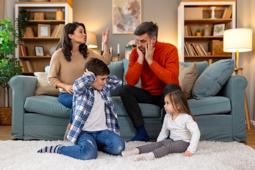 Family looking unhappy together.