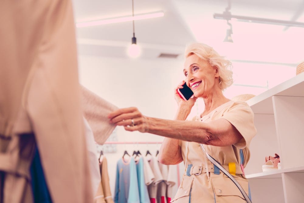 Older woman on the phone.