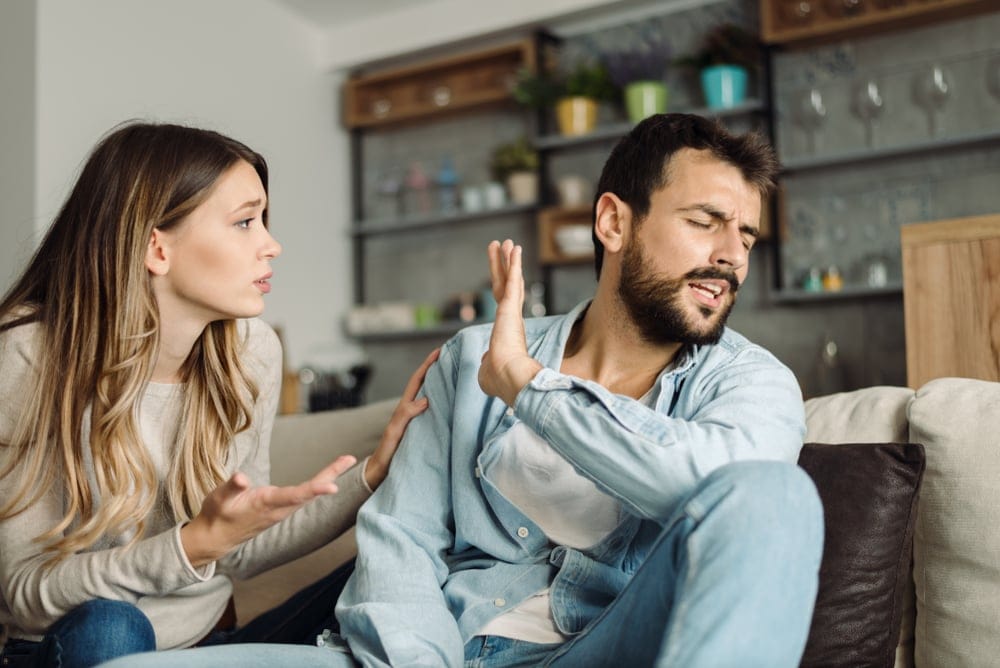 Couple in an argument at home.