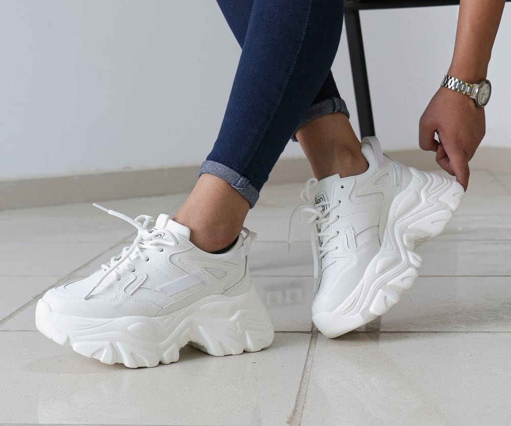 Woman with sneakers on.