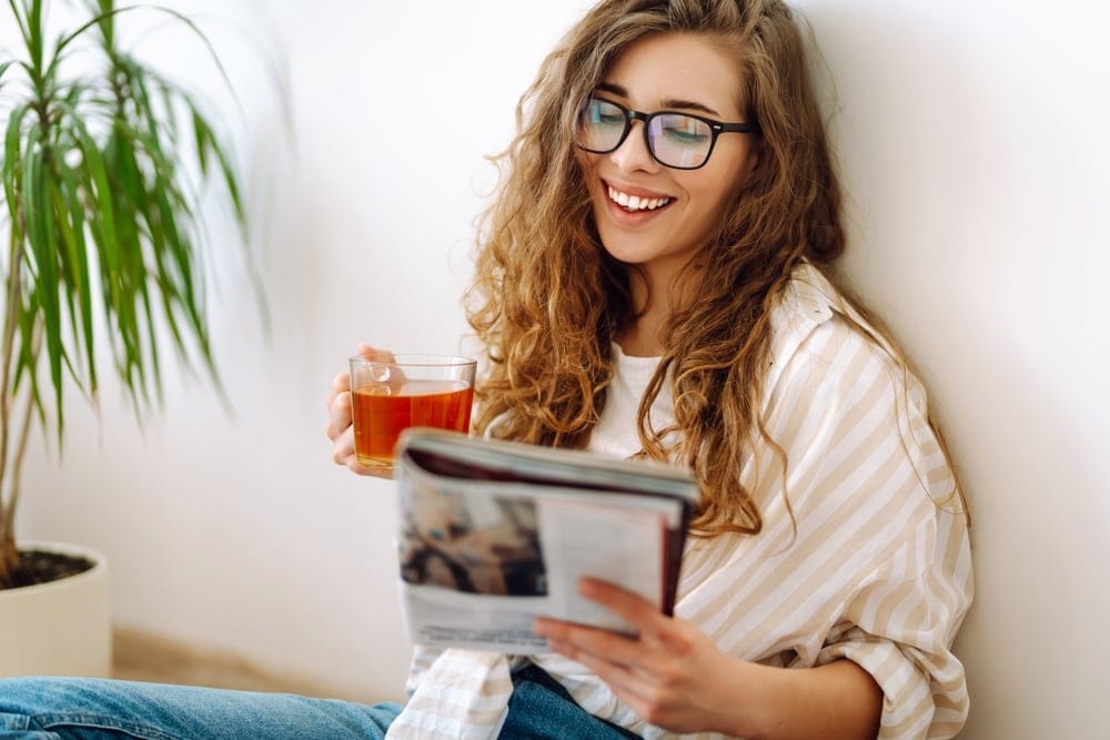 Woman reading a magazine.