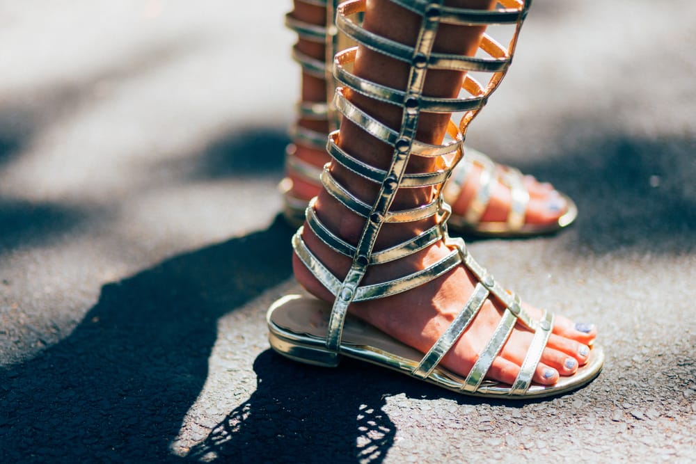 Gladiator boots on a woman.