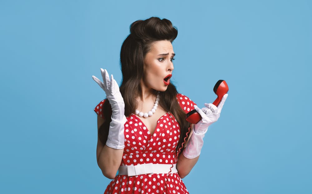 Woman on a landline phone.