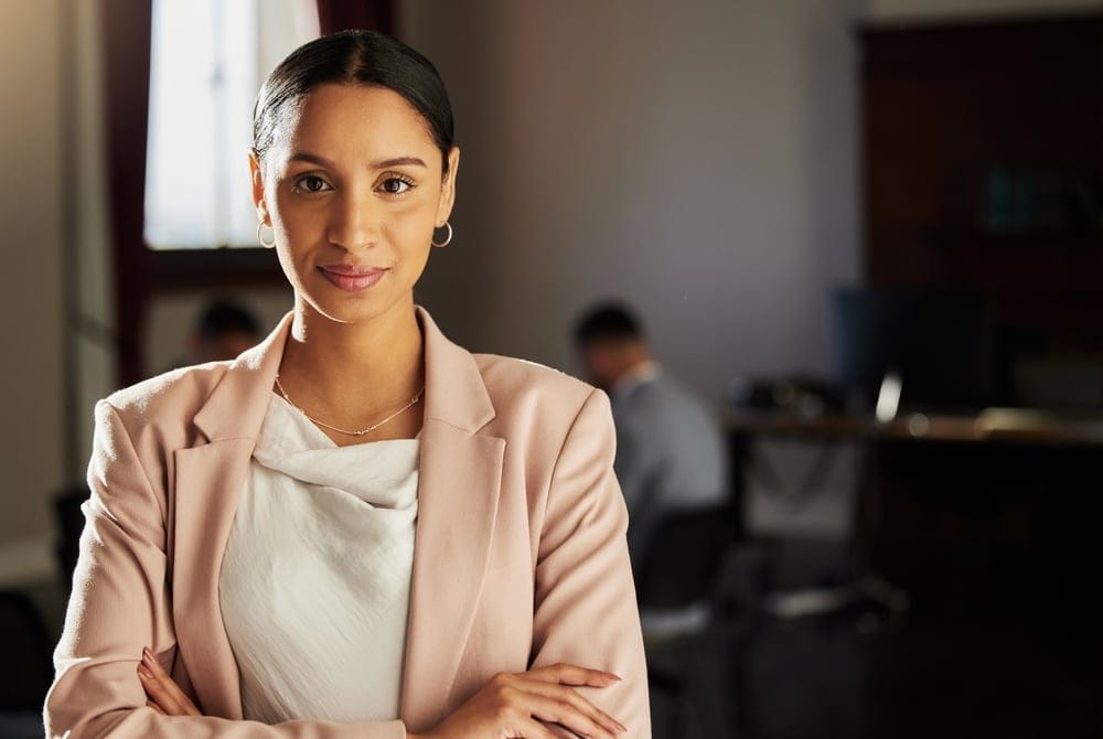 Strong young woman in the workplace.