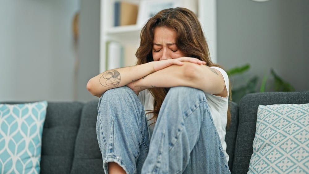 Young woman crying. 