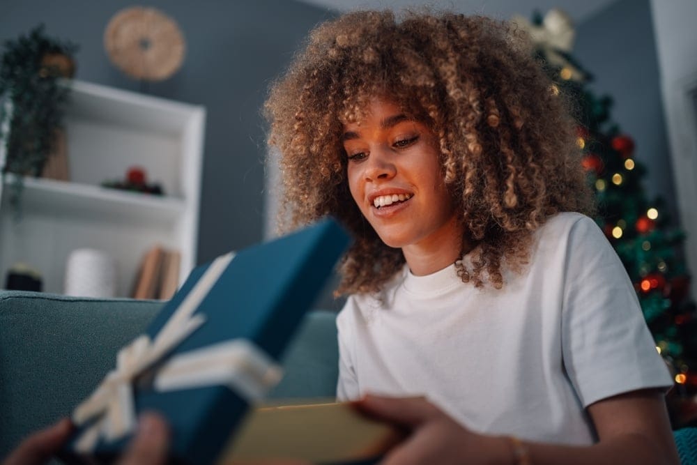 Woman receives a gift.