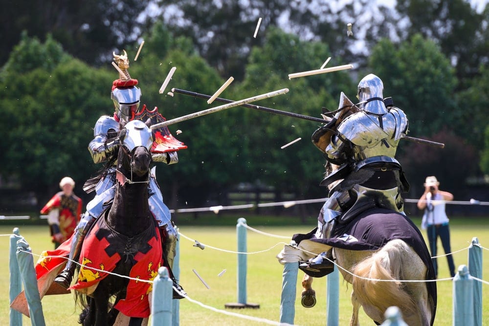 Two knight compete during re-enactment of medieval jousting tournament