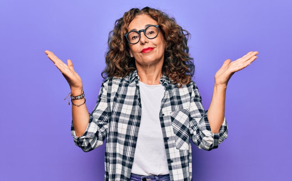 Woman questioning with her gesture.