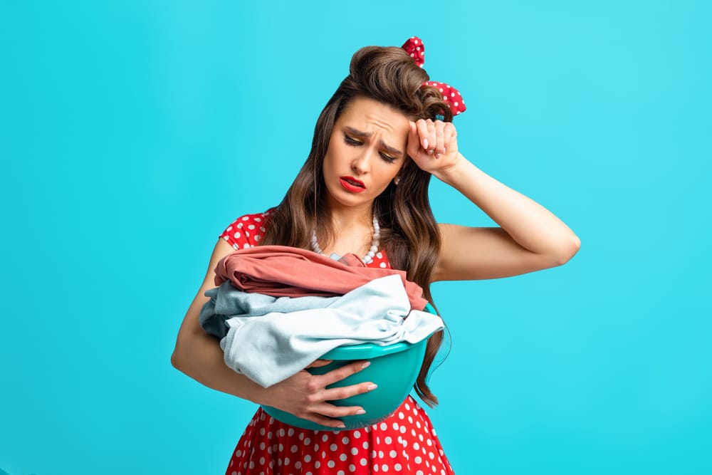 Woman doing her colorful laundry.