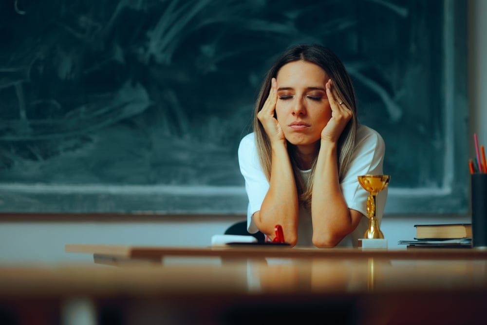 Woman taking on too much at work.