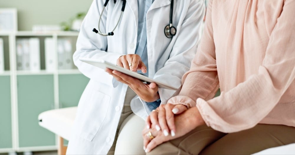 Doctor talking with patient.