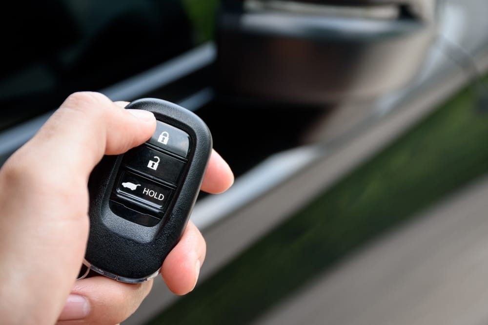 Man holding car keys.