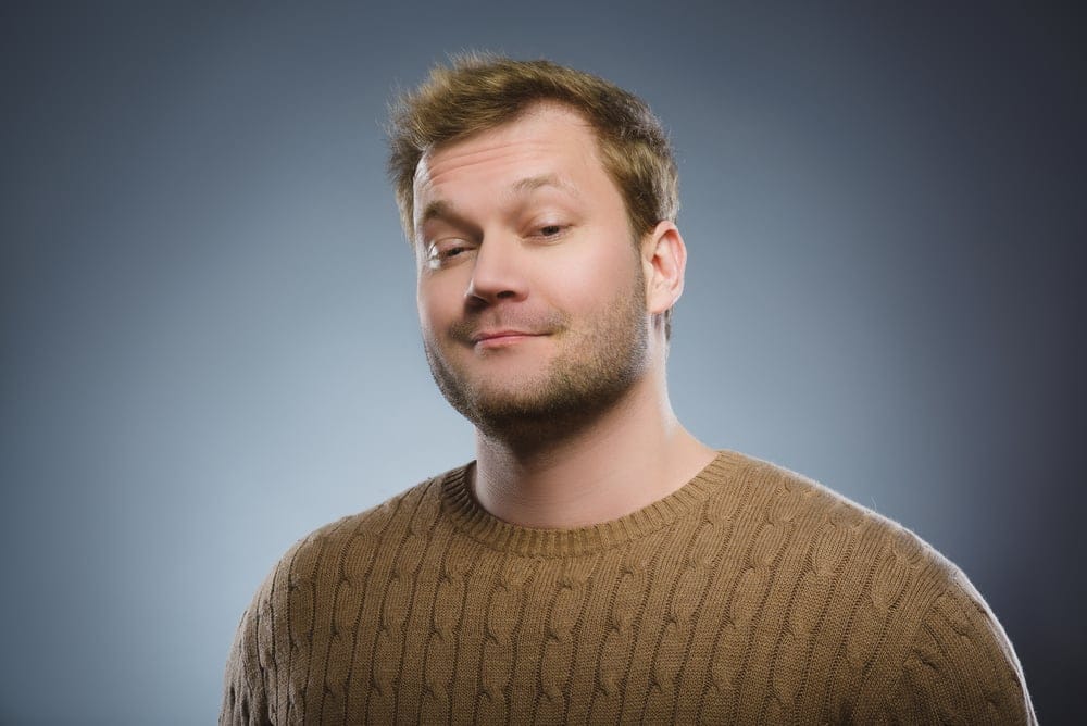 Man looking smug.