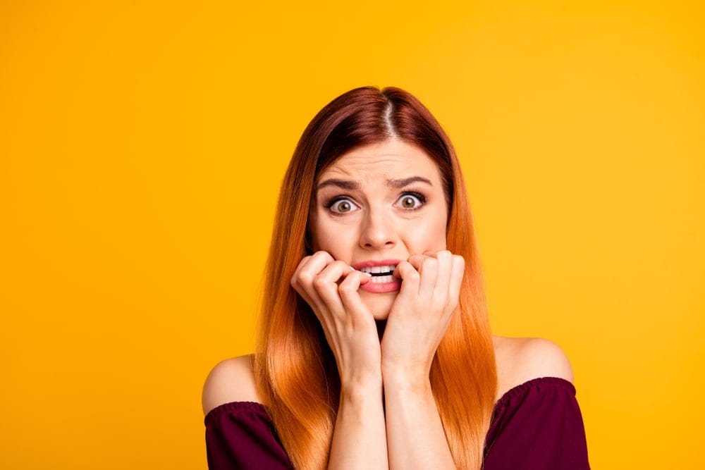 Woman looking unsure of herself.